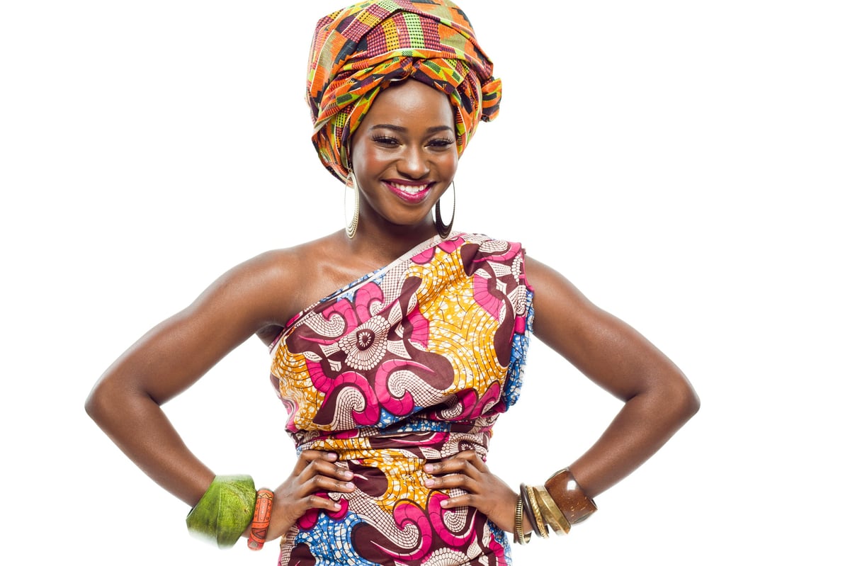 Attractive young African-American fashion model in elegant attire